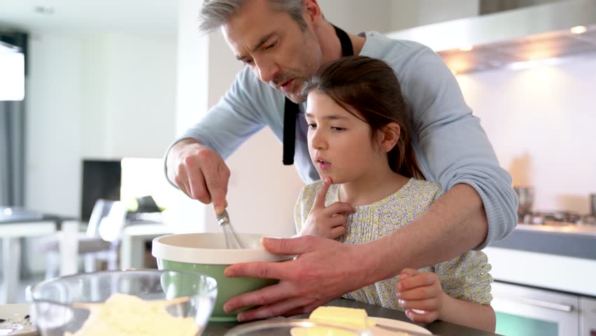 daddy with daughter baking cake stock footage video 100 royalty free 25664783 shutterstock