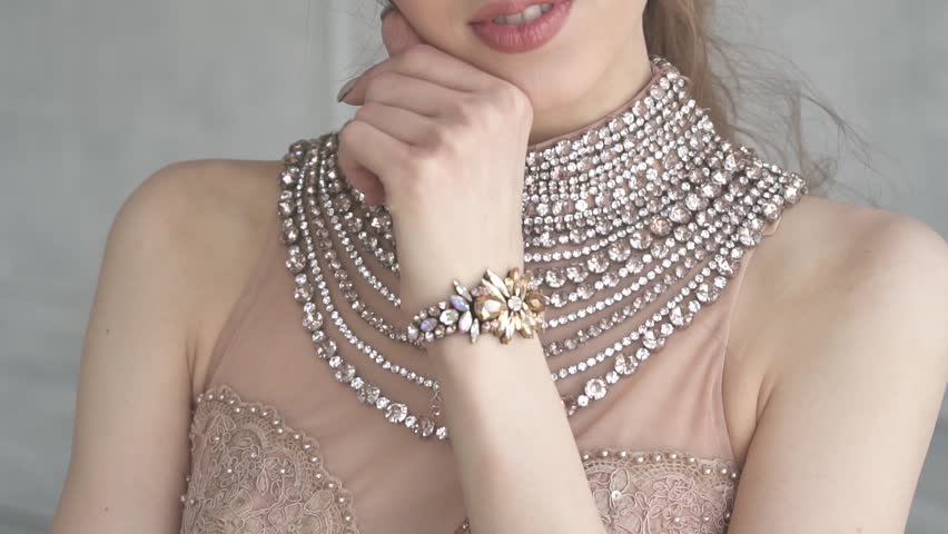 Portrait of young attractive young girl in evening dress