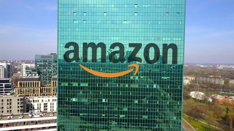 Aerial shot of office skyscraper with Amazon.com logo. Modern office building. Editorial 3D rendering 4K clip