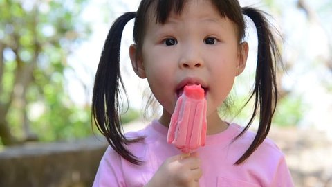 Little Asian Girl Eating Ice Cream Stock Footage Video (100% Royalty ...