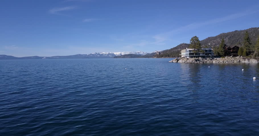 Flying over the surface of Lake Tahoe and then vertical ascent