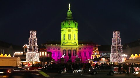 BERLIN, GERMANY - CIRCA MAY 2011: Christmas market at Schloss Charlottenburg, Charlottenburg Castle, illuminated at night Editorial Stock Video