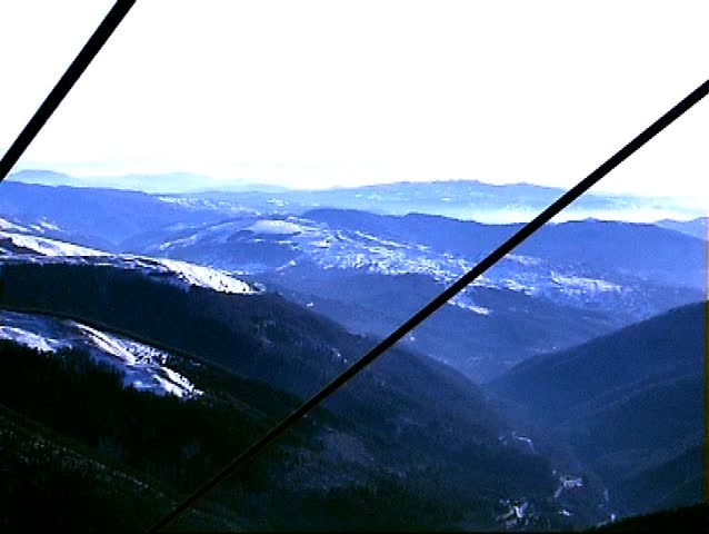 Mountain panoramic landscape in blue, white and black
