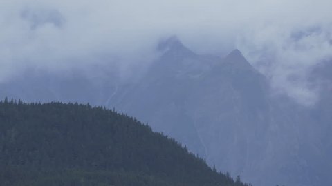 Majestic Alaska mountains, cloudy day