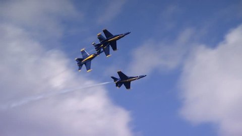 QUONSET, RHODE ISLAND - CIRCA JUNE 2012: Four Blue Angels jets breaking away one plane at a time