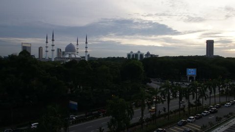 Time lapse footage of Shah Alam City in Selangor, Malaysia. During sunset. Seen here cars were moving along the road while sun setting. Dated April 6th, 2017.