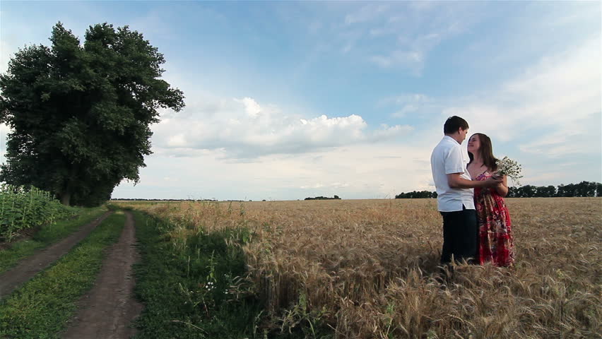 girl and guy in the field