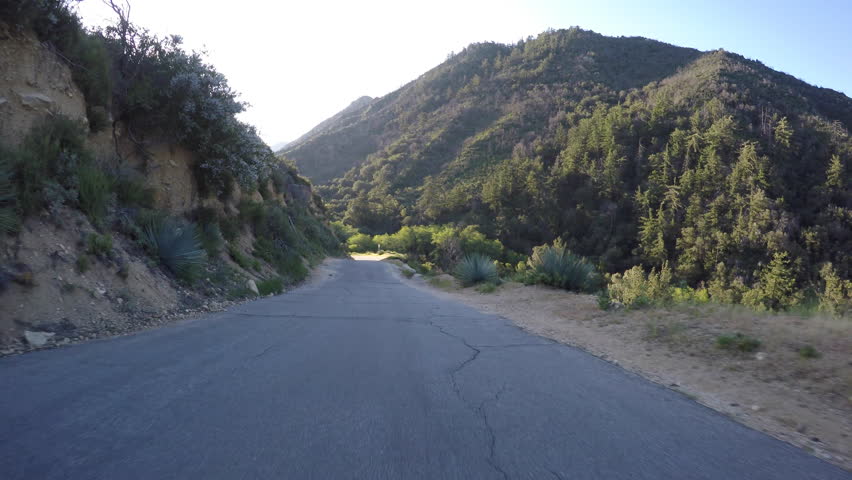 San Gabriel mountain road driving near Switzer Falls in the Angeles National Forest area of Southern California.