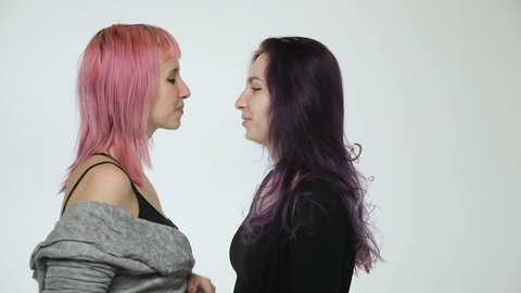Couple lesbian women kissing