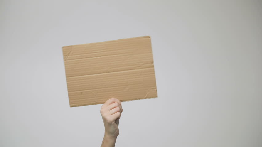 holding blank cardbaord banner