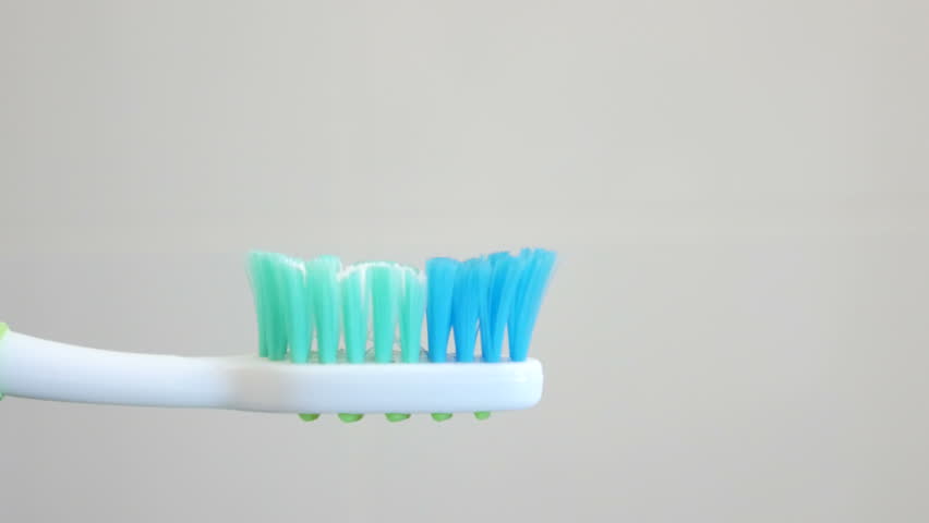 Hand Squeezing Toothpaste On Toothbrush Stock Footage Video (100% 