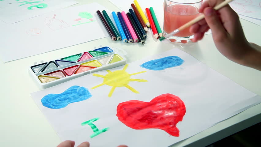 Little boy paints with wet colors I love life. timelapse