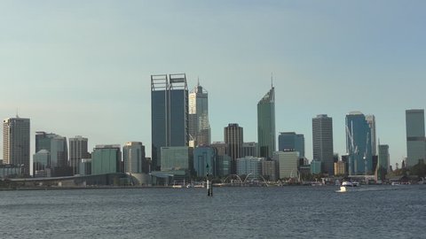 Perth, Australia; April 8, 2017: Panoramic view across Swan River of city skyline Perth, capital Western Australia, regional headquarter of mining and finance companies.