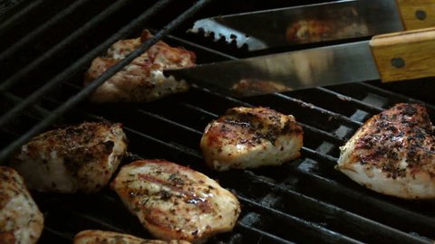 
High quality video of cooking white meat on the grill in real 1080p slow motion 120fps