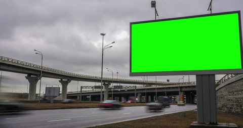 Billboard green screen near the transport interchange. time laps