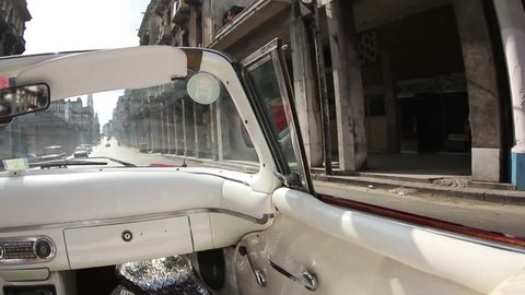 havana street scene shot from a classic convertible car, cuba