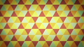 Abstract background of triangles in a geometric pixelated mosaic tile pattern seamless loop for text or logo. The triangles fit into diamond and hexagon shapes. Orange, blue and yellow color scheme. - Powered by Shutterstock - Get 15% off with code: PIKWIZARD15