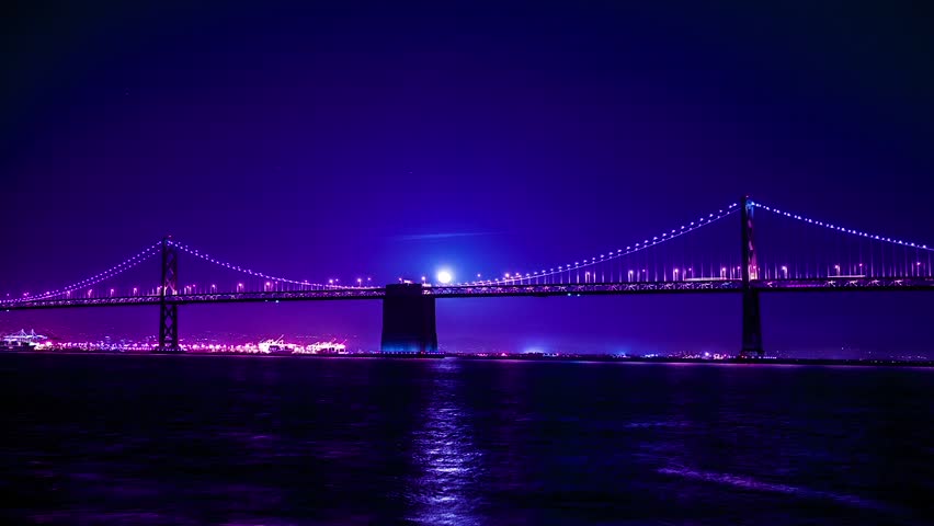 Time lapse of moon rising behind Oakland