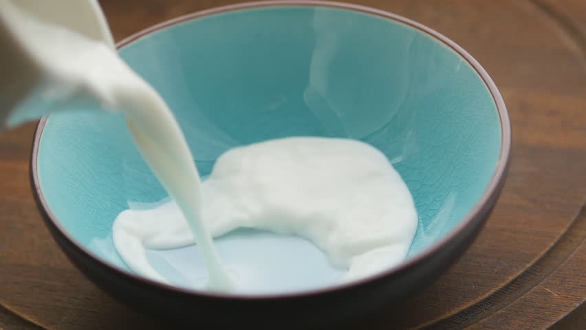 Pouring Milk Into A Blue Stock Footage Video 100 Royalty Free Shutterstock