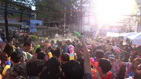 Bangkok, Thailand  April 13, 2017  Songkran Festival Unidentified people celebrate Songkran Day with water fights at Siam Square. Pouring or spraying water to people on Songkran is a Thai tradition.
