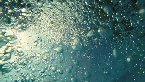 Slow motion : Air bubble Floating up to water surface 
