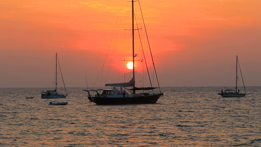 sunset sky and yachting boat in phuket andaman sea southern of thailand