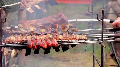 Asado, Traditional Dish in Argentina: Roasted Meat of Beef and Various other Meats, which are Cooked on a Typical Barbecue with Vertical Grills.
