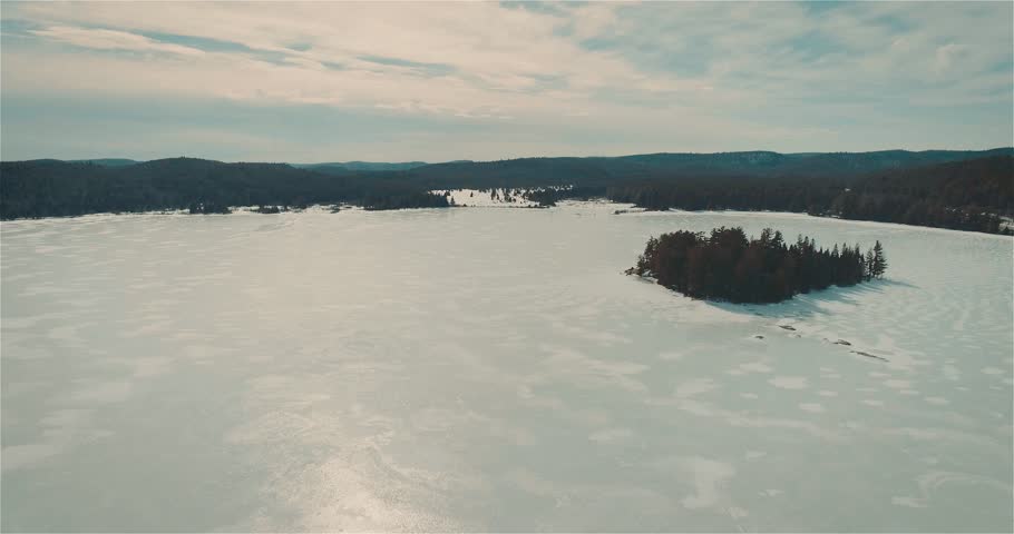 The frozen lakes at winter.
4K Aerial Video Sequence of Algonquin Provincial Park , Canada - The frozen lakes at winter