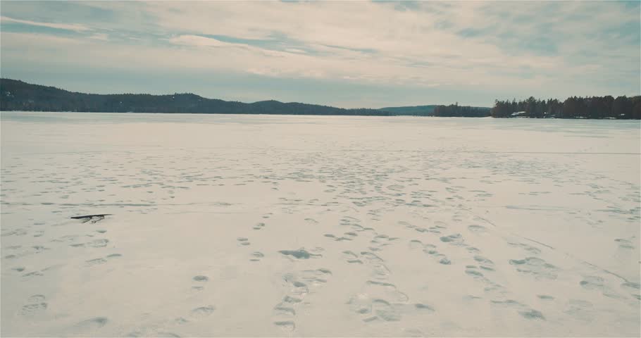 Algonquin Provincial Park , Canada, Aerial Video  - Flight above the frozen lake
4K Aerial Video Sequence of Algonquin Provincial Park , Canada - Flight above the frozen lake
