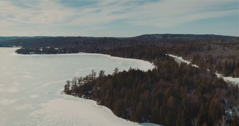 The frozen lakes at winter.
4K Aerial Video Sequence of Algonquin Provincial Park , Canada - The frozen lakes at winter