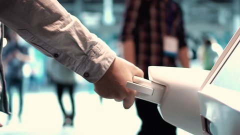 Modern Robotic Technologies. A man communicates with a robot, presses a plastic mechanical arm to the robot, handshake. స్టాక్ వీడియో