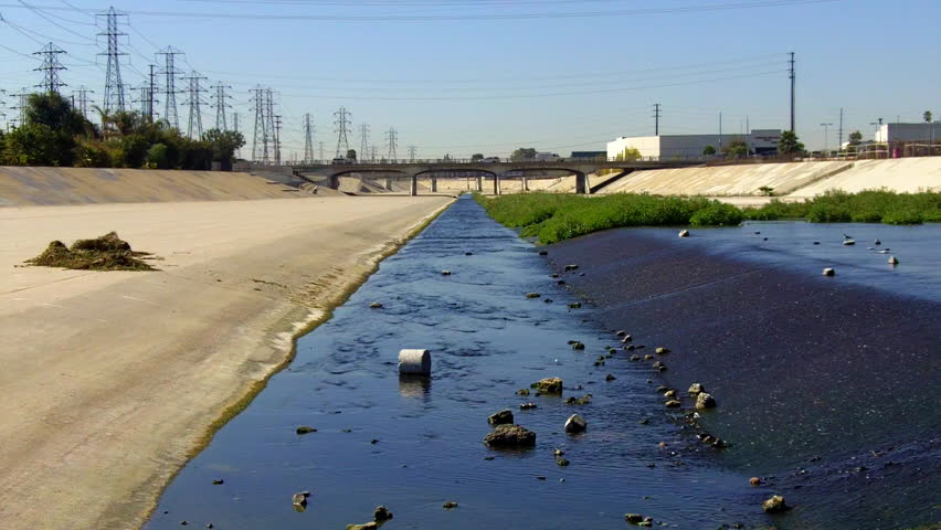 A man-made river of treated sewage flowing in the concrete San Gabriel river
