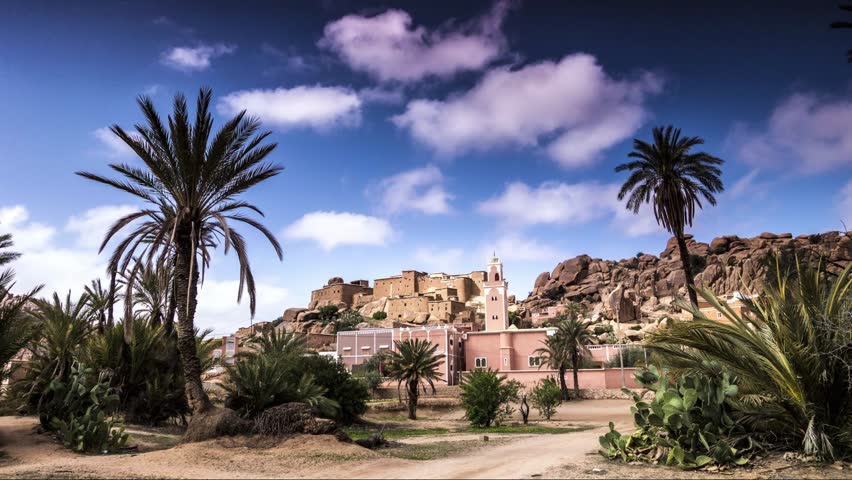 Color wide shot, time-lapse of traditional Berber village in the Ameln Valley of the Anti-Atlas mountains in Morocco.