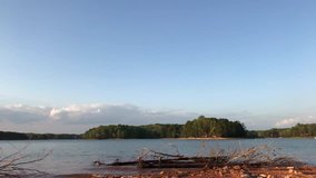 Sunset peaceful 4k video on Lake Lanier with little waves and lots of negative space