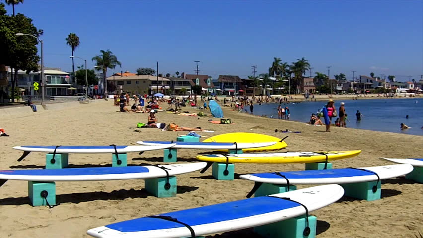 Paddle board surfboards (aka long boards) on the beach in Alamitos Bay in Long