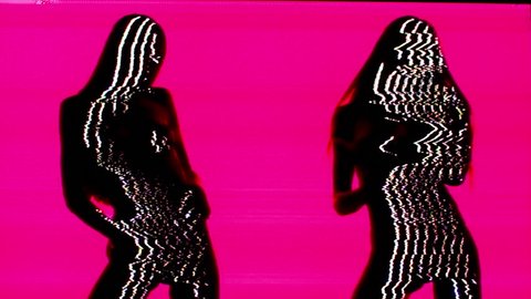silhouette of a beautiful sexy woman posing and slowly doing a striptease. this version has been passed through an analogue video effects unit to add glitch and distortion.