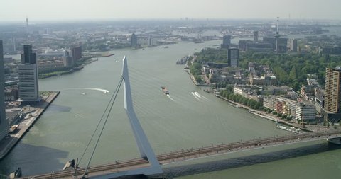 Aerial of the Erasmus Bridge, skyline and the center of Rotterdam, Netherlands.  Shot on a RED Dragon.
