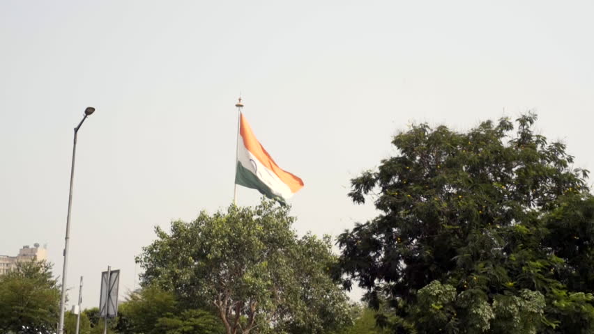 Huge flag of India at Central Park moves in the wind, Connaught Place, Delhi