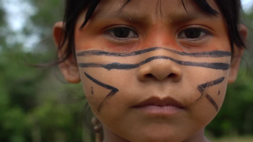 Closeup face of Native Brazilian children at an indigenous tribe in the Amazon Royalty-Free Stock Footage #25996211