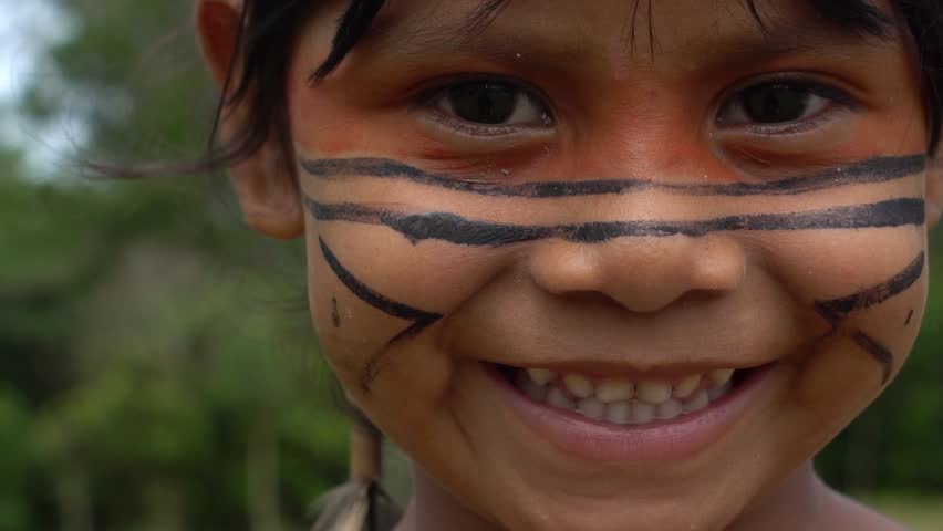 Closeup face of Native Brazilian children at an indigenous tribe in the Amazon | Shutterstock HD Video #25996211