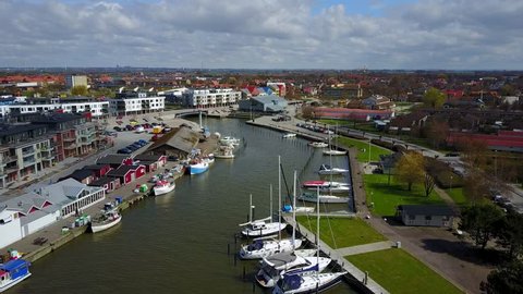 Beautiful aerial view of Sweden nature and yacht port from above near Malmo. Amazing city skyline view.
