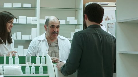 Pharmacist and client have conflict and try to solve the problem at pharmacy