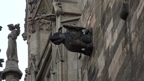Gargoyle on Gothic cathedral in Barcelona. Gothic architecture symbol. Spain.