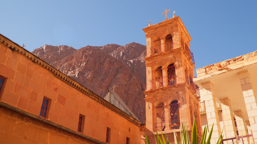 Sinai. Egypt. Saint Catherine's Monastery, commonly known as Santa Katarina lies on the Sinai Peninsula,at the mouth of a gorge at the foot of Mount Sinai. Bell tower of the monastery of St. Catherine Royalty-Free Stock Footage #26020196