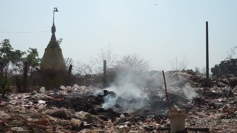 Stupa and garbage in Bago, Myanmar