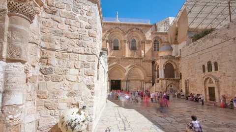 Vew on main entrance in at the Church of the Holy Sepulchre in Old City of Jerusalem timelapse hyperlapse at sunny day