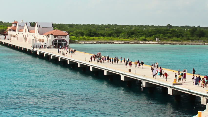 Cruise ship passengers disembark at the pier in Cozumel, Mexico.
