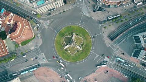 Aerial time lapse of Plaza de España in Barcelona, Spain. Roundabout city traffic, top view. 4K video