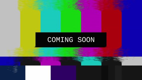 Glitched transmission, distorted noisy signal of SMPTE color bars (a television screen test pattern) with the text Coming Soon.

