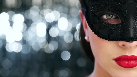 Macro closeup of sexy woman wearing masquerade mask at party 1920x1080